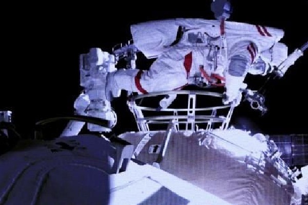 Chinese astronauts conduct spacewalk