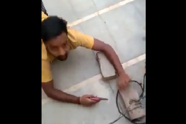 UP Man tries to cut illegal power connection