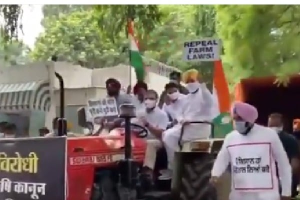 Rahul Gandhi Rides Tractor to Parliament