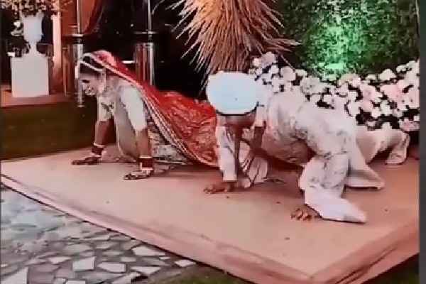 Bride And Groom Do PushUps Onstage In Viral Video