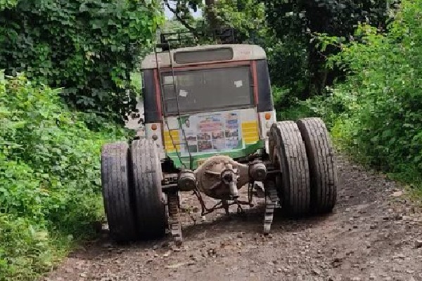 Nadendla shares some photos of a bus which lost its back tyres on a ugly road