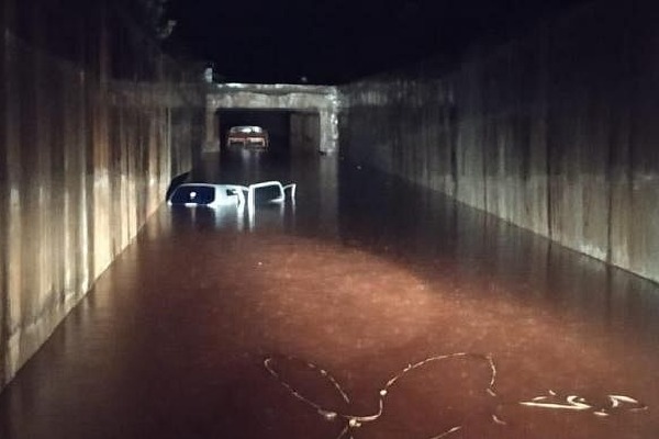 woman dies trying to drive through flooded underpass