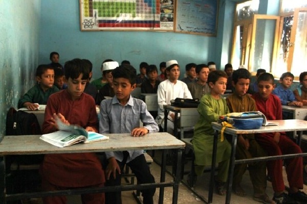Afghanistan's secondary, high schools reopen for boys