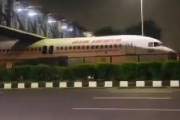 Air India Plane Gets Stuck Under Foot Over Bridge near Delhi Airport 