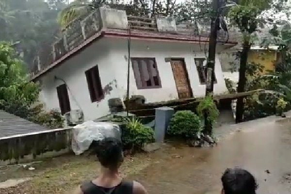 House in Kerala collapsed into a river after heavy rains lashed