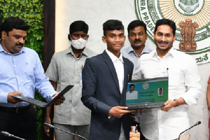 CM Jagan presents laptops to SC and ST IIT rankers