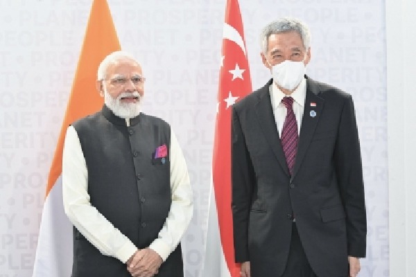 PM Modi meets Singapore counterpart, discusses climate change, Covid