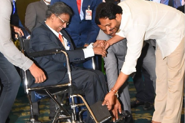 CM Jagan adjusts Kathi Padmarao wheel chair pedals