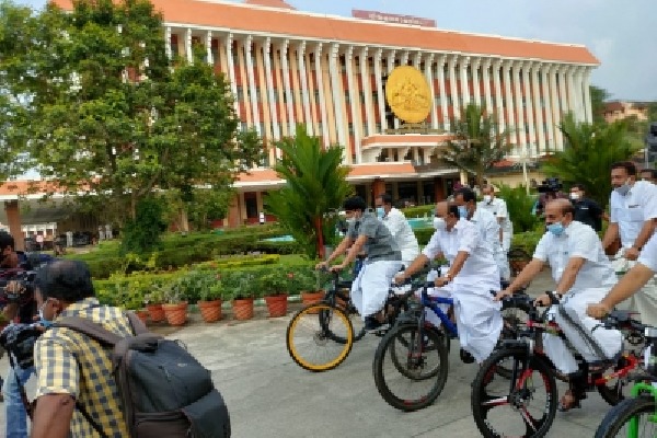 Kerala Oppn MLAs ride bicycles to Assembly in protest