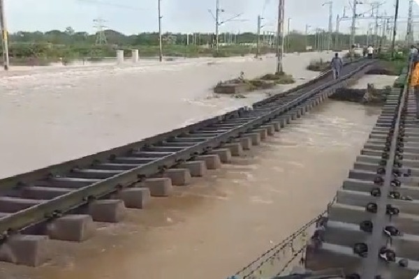 Trains services halted between Vijayawada and Chennai after track washed away at Padugupadu