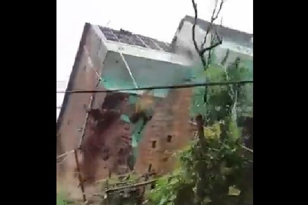 Heavy rains lashes Kadapa district as a house collapse into river