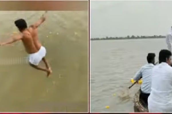YCP MP Gorantla Madhav swims across Peruru Dam