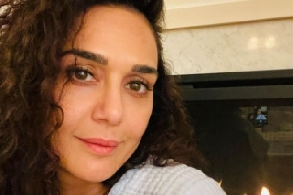 Preity Zinta is loving 'burp cloths, diapers and babies'