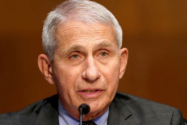 avoid unnecessary travel warns anthony fauci 