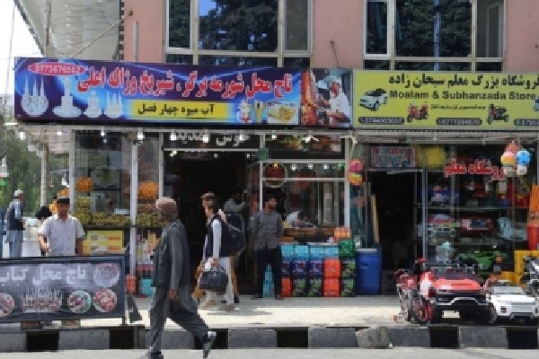 Kabul to remove all photos of women from billboards at shops, business centres
