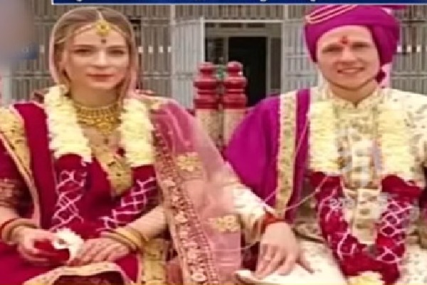 Russian girl and German boy weds in Hindu style in India