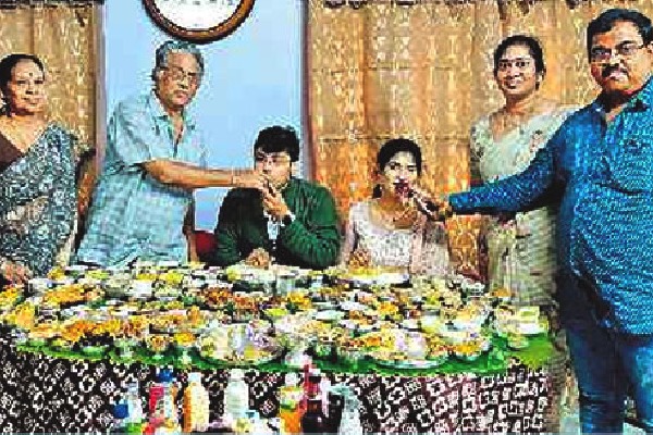 grand father gave sankranthi feast to grand son with 365 varieties of food