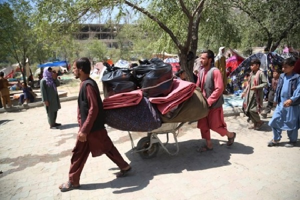 Over a million Afghans flee to Iran as economy collapses