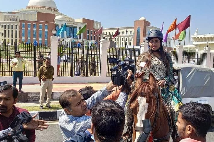 lady mla takes horse ride to assembly