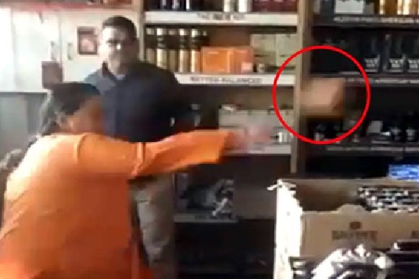 BJP Leader Uma Bharti Vandalises Liquor Shop In Bhopal