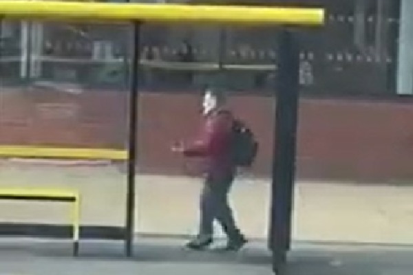 Man Dances In Bus Stop While Waiting For A Bus