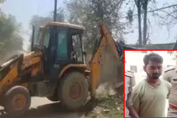 Policemen park bulldozer near house absconding rapist surrenders
