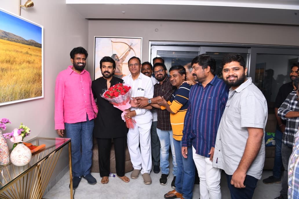 Ram Charan presents gold coins to RRR chief technicians 