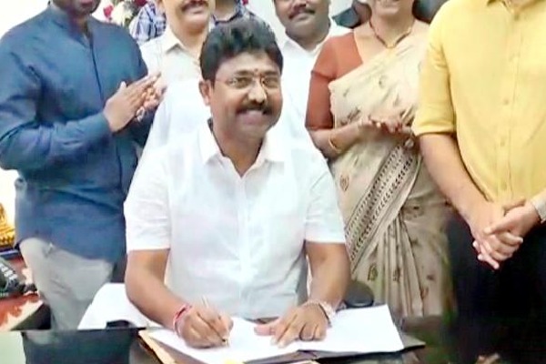 suresh takes oath as minister 