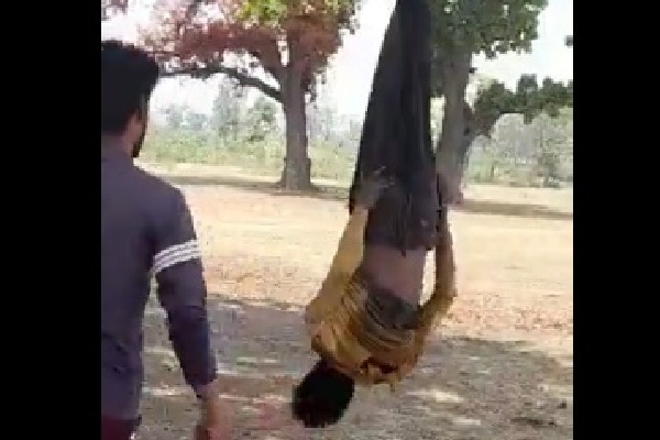 A man was thrashed by 5 people as he was hung upside down  