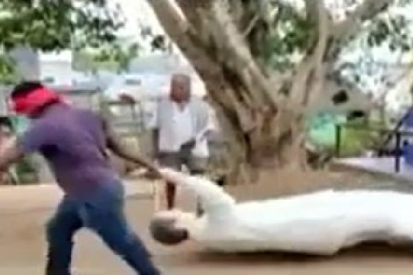 AP: Jana Sena supporter pulls down YSR statue, drags on road; thrashed