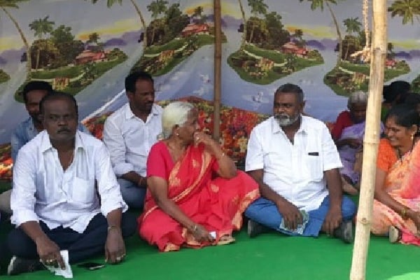 YSRCP corporator sits in dharna against revenue officers