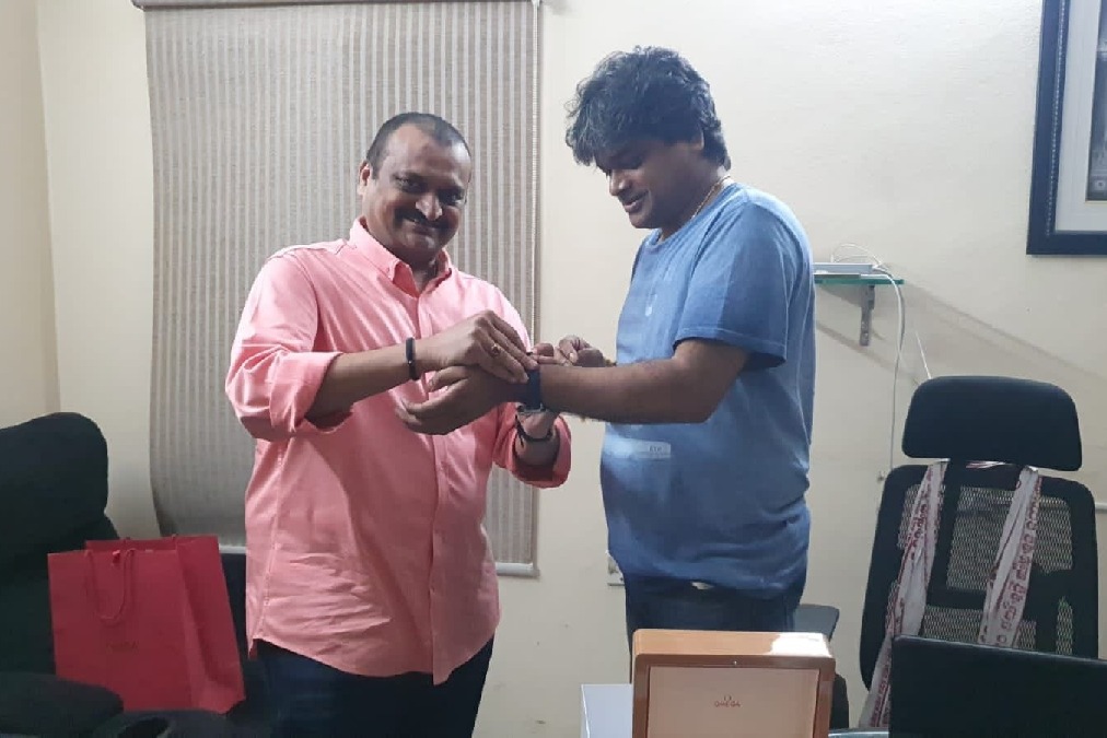 Bandla Ganesh Gifts a pricey watch to Harish Shankar