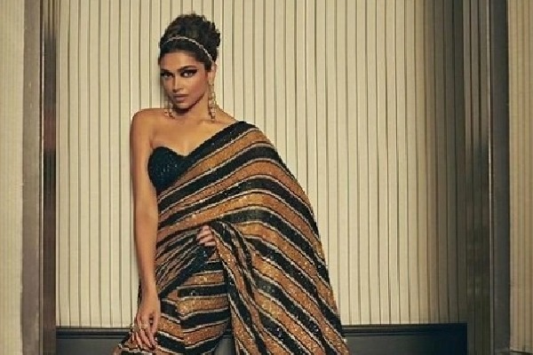 Deepika walks Cannes red carpet in Sabyasachi sari inspired by Royal Bengal tiger