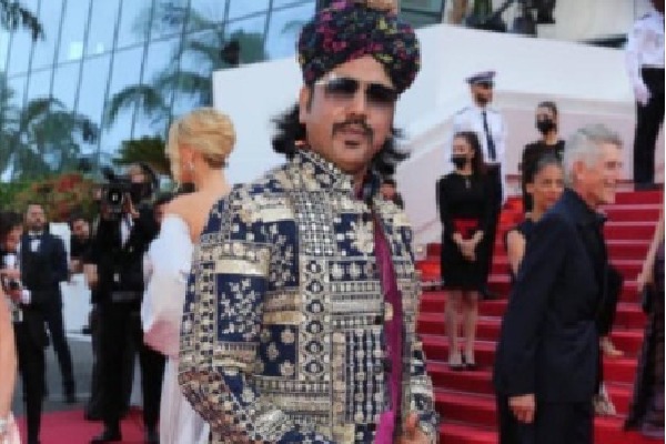 First Time Folk Singer Walks On Cannes Red Carpet