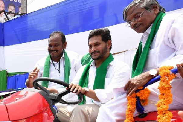 Andhra CM flags off distribution of tractors, harvesters