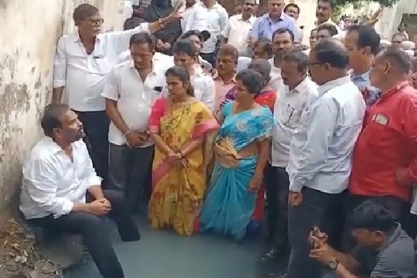 Andhra's ruling party MLA enters drain in novel protest
