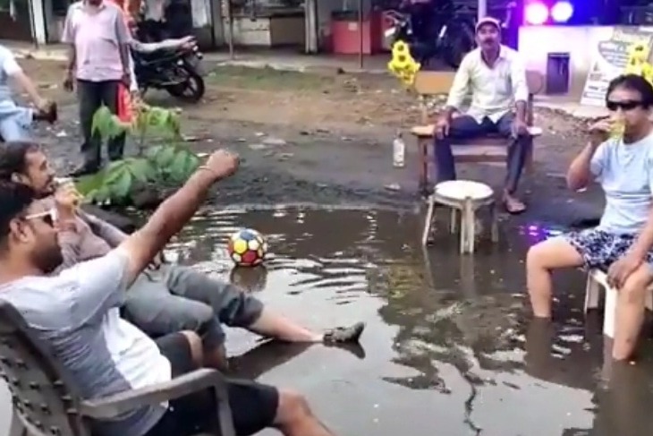 What an idea! MP residents throw party on pothole-filled road