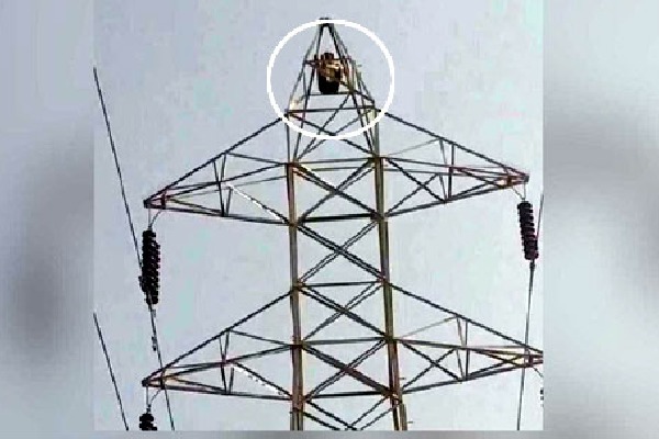 Youth climbs on top of high tension electricity tower after his 15 year old partner refuses to marry him