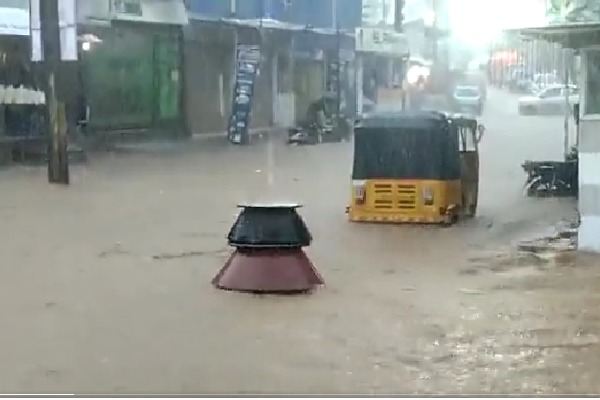 Biryani pots float away in flood waters