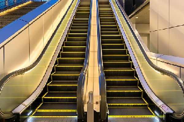 12 students, teacher injured after slipping on escalator