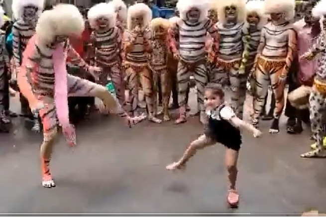  Little girl dances with street artists in karnatakas udupi