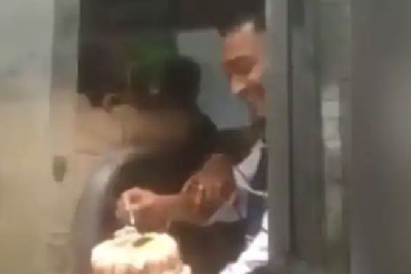 Murder accused cuts birthday cake while sitting inside police van in Maharashtra