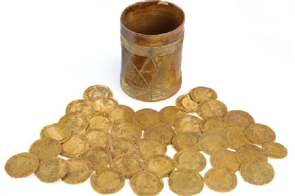 Gold coins discovered under kitchen floorboards in england