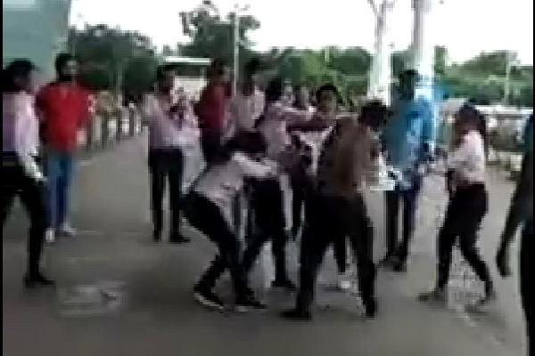 Women angrily tear off young mans shirt at raipur airport