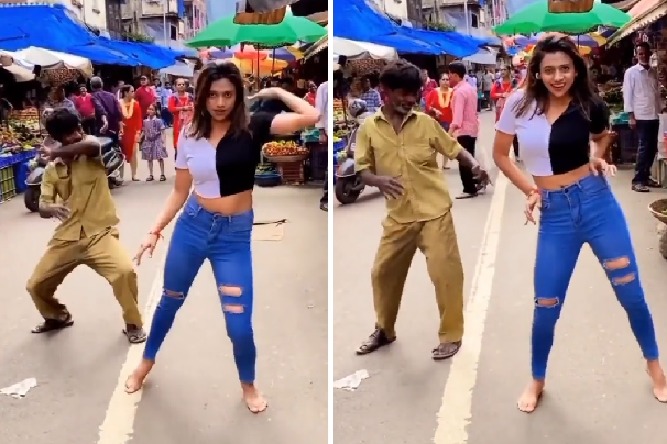 Girl dances on a busy street but this man takes all the attention