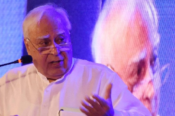 'Freezing democracy', Sibal slams EC over Sena symbol freeze