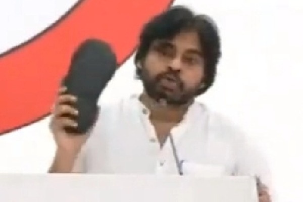 Angry Pawan Kalyan shows 'chappal' to warn YSRCP