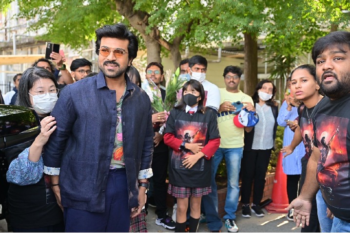 'RRR' star Ram Charan hits it off with school kids in Japan