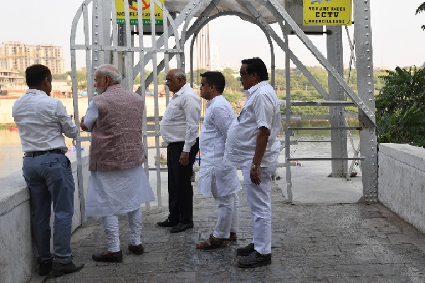 Modi visits cable bridge incident site in Morbi