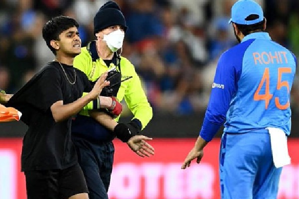 Fan invades field to meet Rohit Sharma at MCG fined Over Rs 6 Lakhs